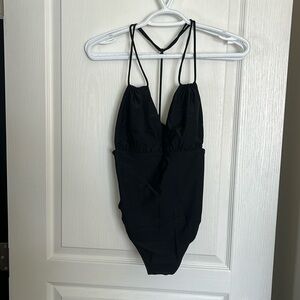 Black plunge one piece bathing suit